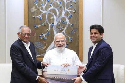 TVS Motor chief met Prime Minister Modi. IMAGE CREDIT TO PIB