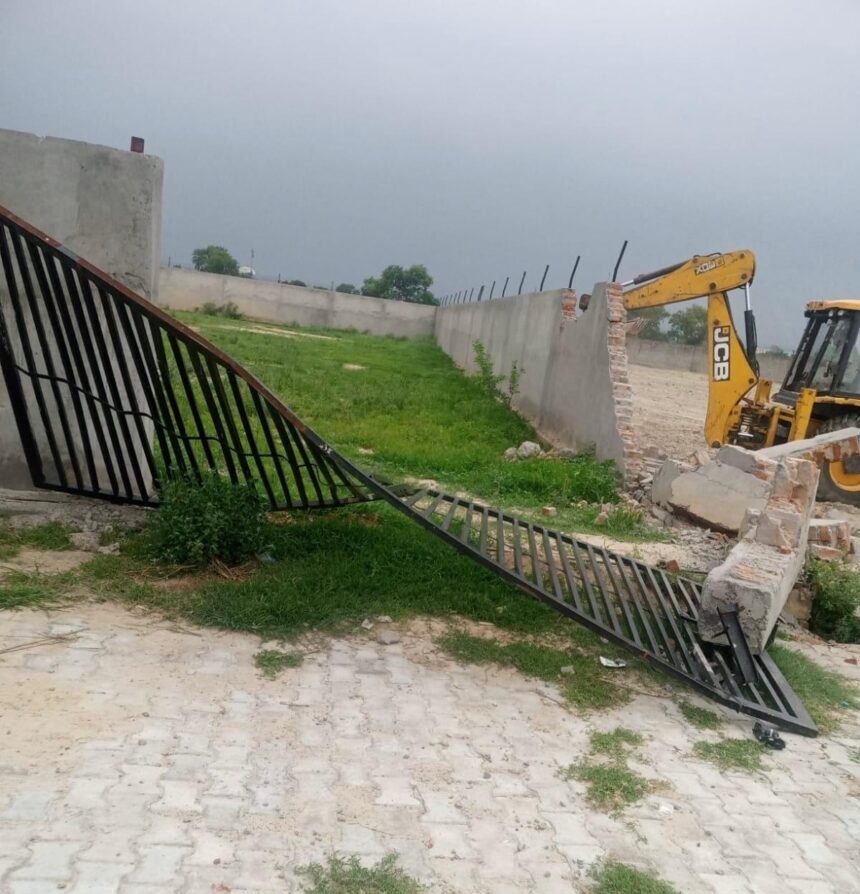 GDA bulldozer rolls over illegal colony sprawling across 45,000 square meters in village Galand IMAGE CREDIT TO GDA