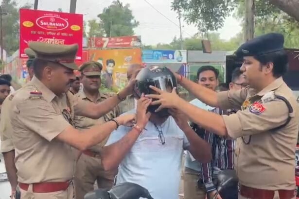 ACP Srivastava Distributes Helmets in Kaushambi, Image credit to police