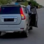 Deadly Stunt on Moving Car: Video of Youth Standing on Window Goes Viral; Police Imposes ₹36,000 Fine IMAGE CREDIT TO REPORTER