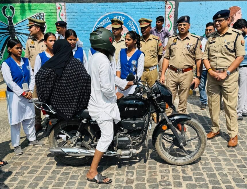School girls teamed up with traffic police to spread the message of safe driving to motorists IMAGE CREDIT TO POLICE