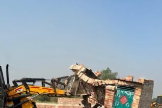 In the submerged area of Tughlakpur, the Greater Noida Authority carried out a bulldozer operation, freeing 40,000 square meters of land IMAGE CREDIT TO AUTHORITY
