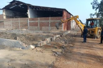Authority's bulldozer on illegal plating, 13 thousand square meters area demolished in Pilkhuwa area IMAGE CREDIT TO AUTHORITY
