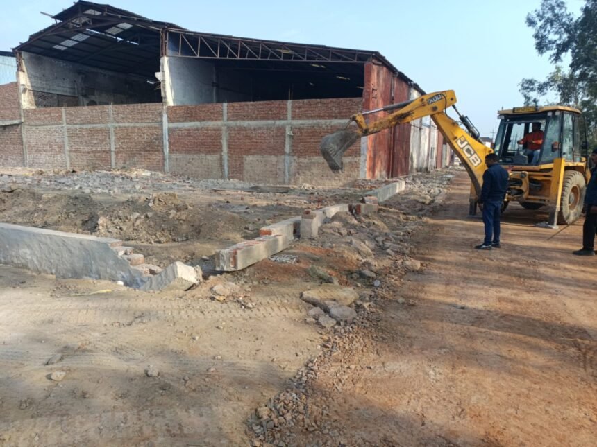 Authority's bulldozer on illegal plating, 13 thousand square meters area demolished in Pilkhuwa area IMAGE CREDIT TO AUTHORITY