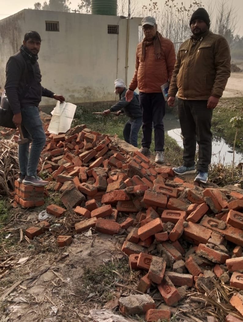 Tehsil administration's action: Illegal occupation removed from barn land IMAGE CREDIT TO REPORTER