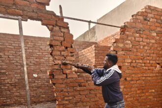 Housing Development cracks down on illegal construction in Vasandhura scheme, fourth floor demolished despite protests IMAGE CREDIT TO आवास विकास