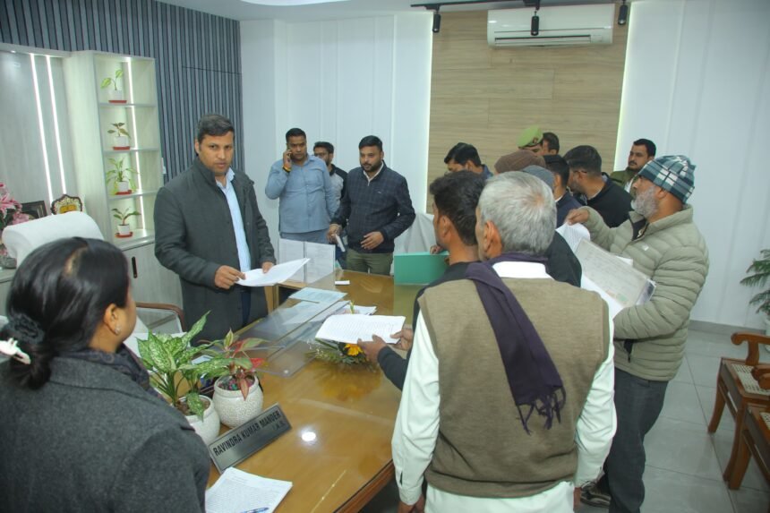 A public hearing was organized under the chairmanship of DM Ravindra Kumar. IMAGE CREDIT TO INFORMATION DEPARTMENT