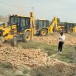 Bulldozer action against illegal encroachments in flood-prone area; land worth ₹30 crore cleared. IMAGE CREDIT TO AUTHORITY