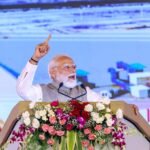 The historic inauguration of Jewar Airport took place under mobile phone lights, with chants of “Modi-Modi” echoing through the crowd. IMAGE CREDIT TO सूचना विभाग