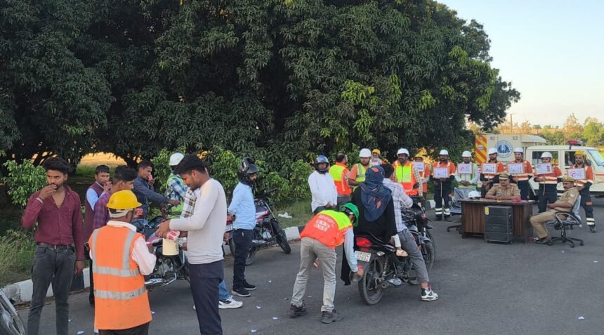 Road safety awareness campaign at Bhanaida Toll Plaza; those following traffic rules were honored with flowers IMAGE CREDIT TO पुलिस