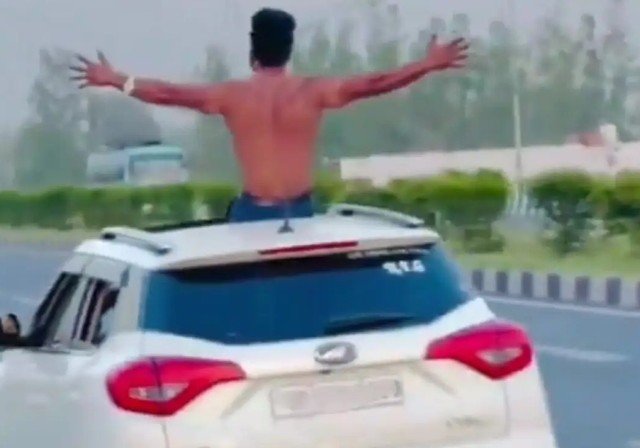 On NH-9, a viral video showed a person performing a stunt while semi-nude on the roof of a car; a challan of ₹21,500 was issued. IMAGE CREDIT TO POLICE
