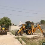 Major GDA action in Modinagar: Bulldozers used on illegal colonies; roads and boundary walls demolished. IMAGE CREDIT TO प्राधिकरण