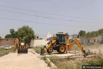 Major GDA action in Modinagar: Bulldozers used on illegal colonies; roads and boundary walls demolished. IMAGE CREDIT TO प्राधिकरण