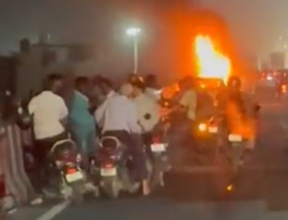 A moving car turned into a fireball, causing panic on NH-9. IMAGE CREDIT TO POLICE