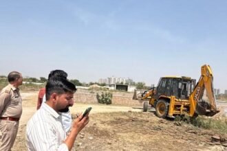 Bulldozer action against encroachment in the Bisrakh floodplain area; 25,000 square meters of land freed. IMAGE CREDIT TO प्राधिकरण