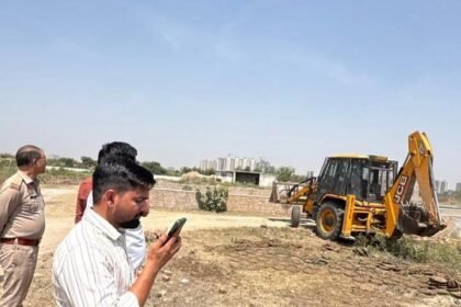 Bulldozer action against encroachment in the Bisrakh floodplain area; 25,000 square meters of land freed. IMAGE CREDIT TO प्राधिकरण