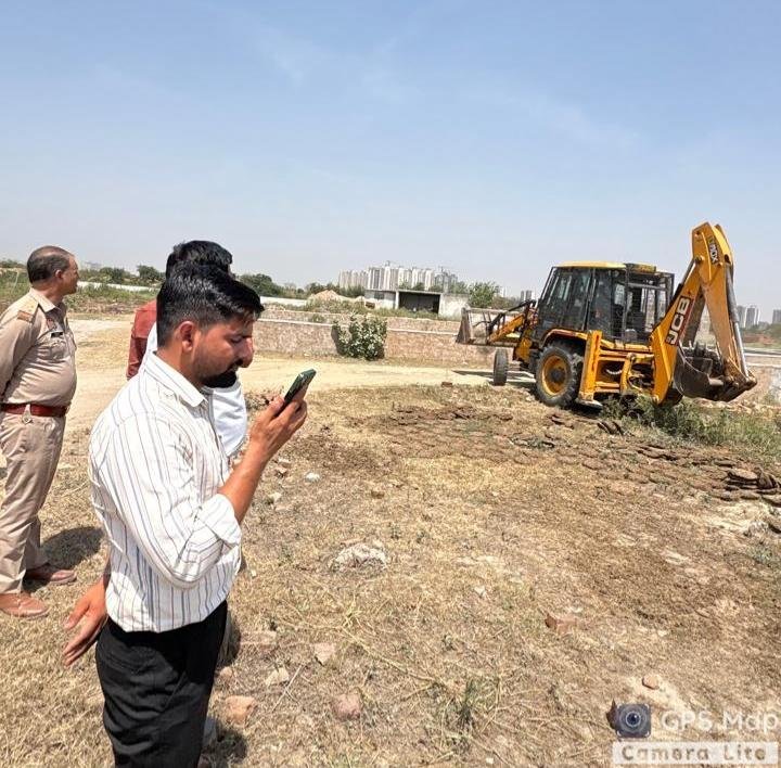 Bulldozer action against encroachment in the Bisrakh floodplain area; 25,000 square meters of land freed. IMAGE CREDIT TO प्राधिकरण