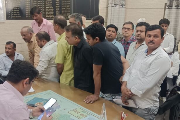 Shopkeepers affected by the construction of a railway overbridge staged a protest at the tehsil office. IMAGE CREDIT TO REPORTER