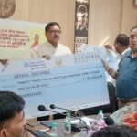 A crop insurance compensation distribution program was held under the chairmanship of the Chief Development Officer, in which symbolic cheques were distributed to 10 farmers. IMAGE CREDIT TO सूचना विभाग
