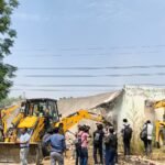 In Dasna, an illegal madrasa built on one hectare of government land was demolished, and orders were issued to recover ₹1.23 crore. IMAGE CREDIT TO INFORMATION DEPARTMENT