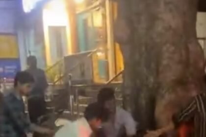 "Young Man Attacked Outside Domino’s Pizza Shop, Beaten with Kicks and Punches; Video Goes Viral." IMAGE CREDIT TO रिपोर्टर