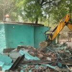 "An illegal shrine built on UPSIDA land in Tronica City was demolished by a bulldozer." IMAGE CREDIT TO यूपीसीडा