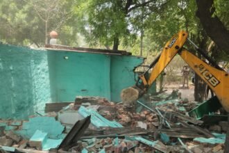 "An illegal shrine built on UPSIDA land in Tronica City was demolished by a bulldozer." IMAGE CREDIT TO यूपीसीडा
