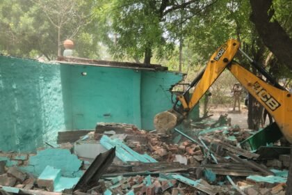 "An illegal shrine built on UPSIDA land in Tronica City was demolished by a bulldozer." IMAGE CREDIT TO यूपीसीडा