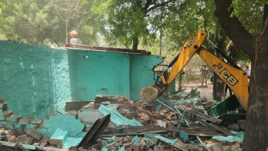 "An illegal shrine built on UPSIDA land in Tronica City was demolished by a bulldozer." IMAGE CREDIT TO यूपीसीडा