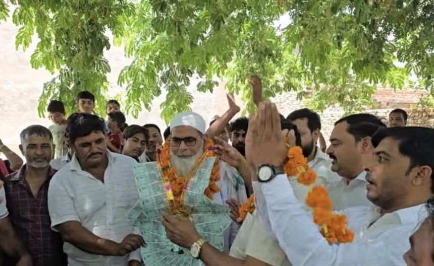 Grand Welcome Accorded to Farmer Zafar Khan, Who Traveled by Air Wearing Simple Slippers — IMAGE CREDIT TO रिपोर्टर