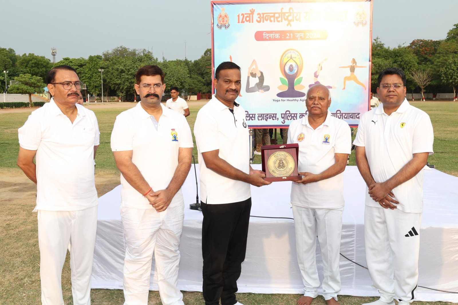 12th International Yoga Day: Administrative officials along with police personnel performed yoga in Ghaziabad. IMAGE CREDIT TO सूचना विभाग