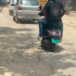 Dilapidated Service Road of Under-Construction Railway Overbridge Turns Dangerous, Public Angered Over Potholes and Slow Construction Pace IMAGE CREDIT TO: रिपोर्टर
