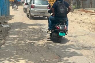 Dilapidated Service Road of Under-Construction Railway Overbridge Turns Dangerous, Public Angered Over Potholes and Slow Construction Pace IMAGE CREDIT TO: रिपोर्टर