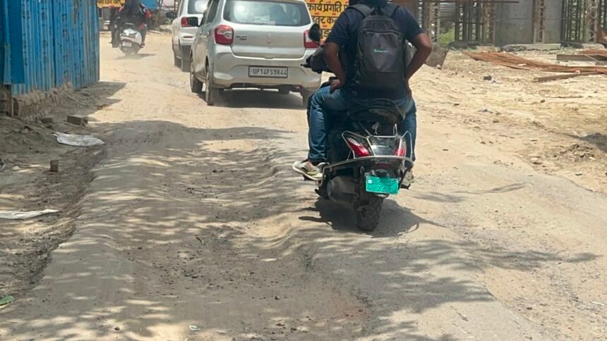 Dilapidated Service Road of Under-Construction Railway Overbridge Turns Dangerous, Public Angered Over Potholes and Slow Construction Pace IMAGE CREDIT TO: रिपोर्टर