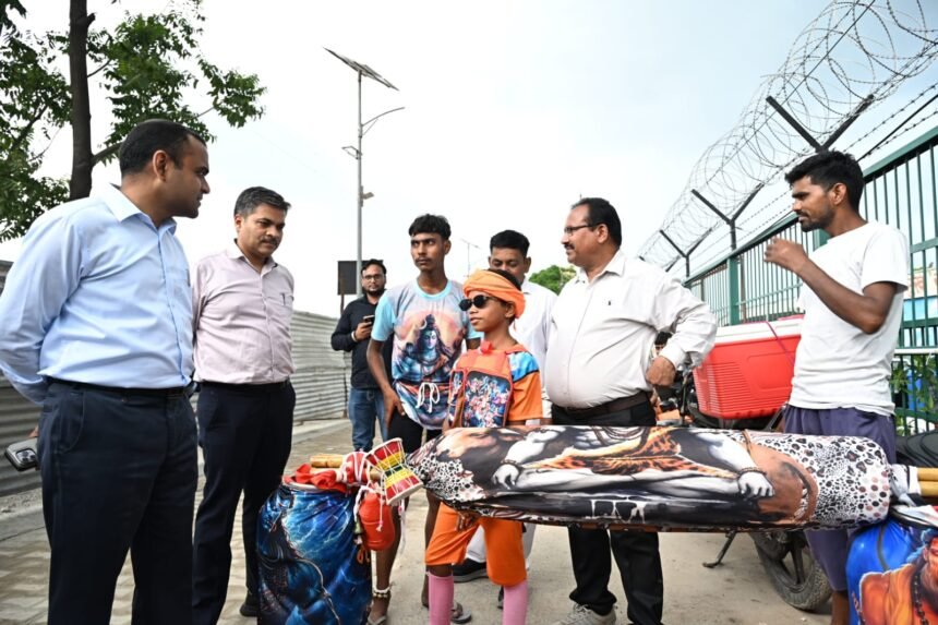 District Magistrate Inspects Arrangements on Kanwar Track Route, Takes Feedback from Shiva Devotees IMAGE CREDIT TO सूचना विभाग