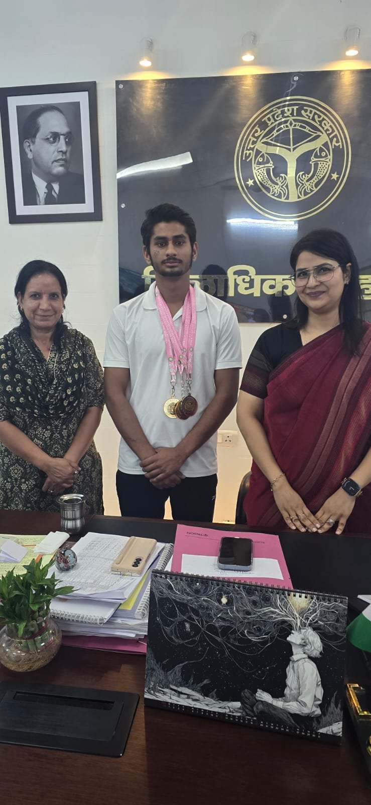 District Magistrate Honours Rudra Kardam, Winner of the State-Level Shooting Championship IMAGE CREDIT TO सूचना विभाग