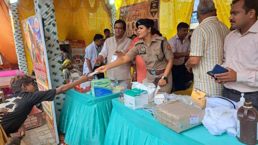 Police Also Step Forward in Service of Shiva Devotees; ACP Priyashree Pal Distributes First-Aid Supplies at Kanwar Camps IMAGE CREDIT TO पुलिस