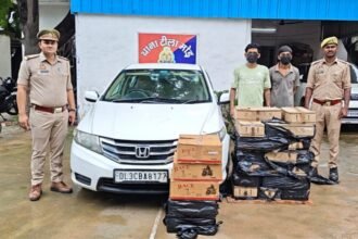 Teela Mor Police Arrest Two Accused for Smuggling Haryana-Branded Liquor in a Luxury Car IMAGE CREDIT TO पुलिस