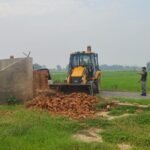 Authority Bulldozer Action Against Encroachment in Bilaspur, 24,000 Sq. Metres of Land Freed — IMAGE CREDIT TO प्राधिकरण