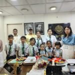 Students of American EduGlobal Academy Tie Rakhi to the District Magistrate — IMAGE CREDIT TO सूचना विभाग
