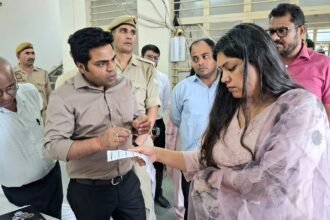 Writing District Magistrate Reviews Preparations for FLC at EVM-VVPAT Warehouse IMAGE CREDIT TO सूचना विभाग