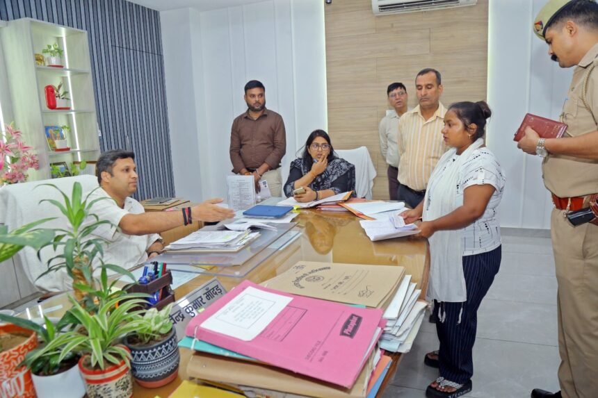 District Magistrate Ravindra Kumar Mondal Heard People’s Grievances During a Public Hearing IMAGE CREDIT TO सूचना विभाग