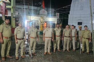Jewar Police Conducts Foot Patrol Ahead of Janmashtami Procession and Kabaddi Competition IMAGE CREDIT TO पुलिस