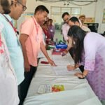 District Election Officer Reviews FLC Work at Warehouse IMAGE CREDIT TO सूचना विभाग