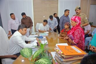 Woman arrives at public grievance hearing with a complaint; officials direct on-the-spot action for an Antyodaya card, pension application and Ayushman card IMAGE CREDIT TO सूचना विभाग