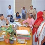 The District Magistrate heard grievances during the public hearing and assured a differently-abled woman of an Antyodaya-Ayushman card and housing. IMAGE CREDIT TO सूचना विभाग