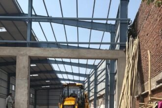 GDA Bulldozer Takes Action Against Illegal Warehouse in Raj Nagar Extension IMAGE CREDIT TO प्राधिकरण