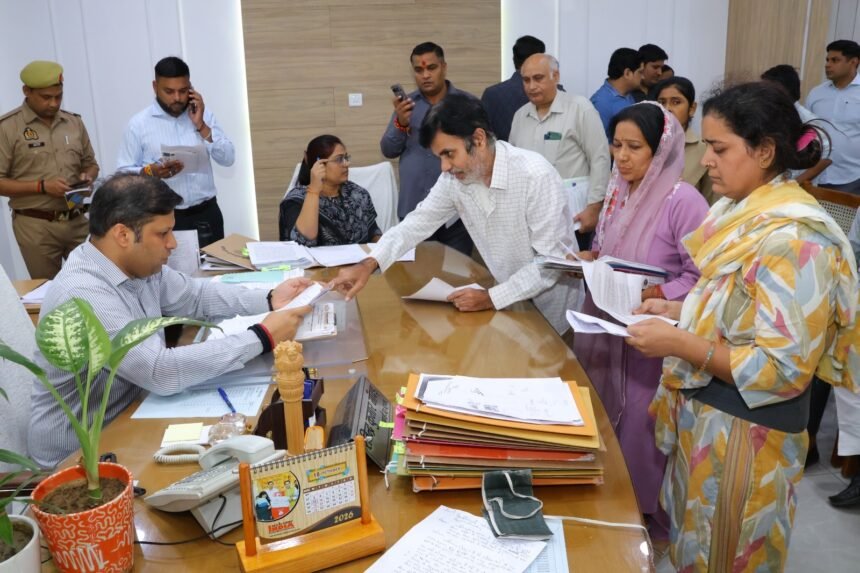 DM Hears Public Grievances During Public Hearing, Directs Officials to Ensure Eligible Beneficiaries Receive Scheme Benefits — IMAGE CREDIT TO सूचना विभाग